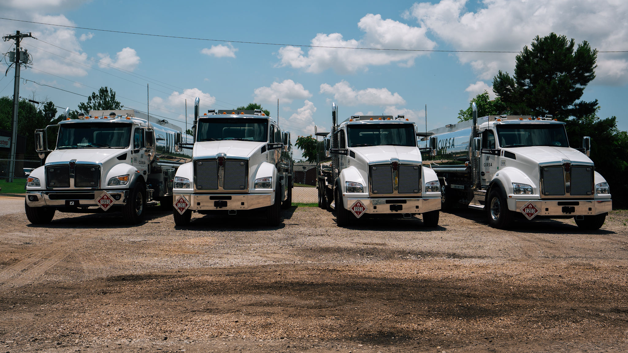 Cursa Fuel Co. fleet — four tanker trucks ready to deploy